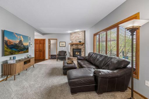 Family room with plantation shutters and gas fireplace