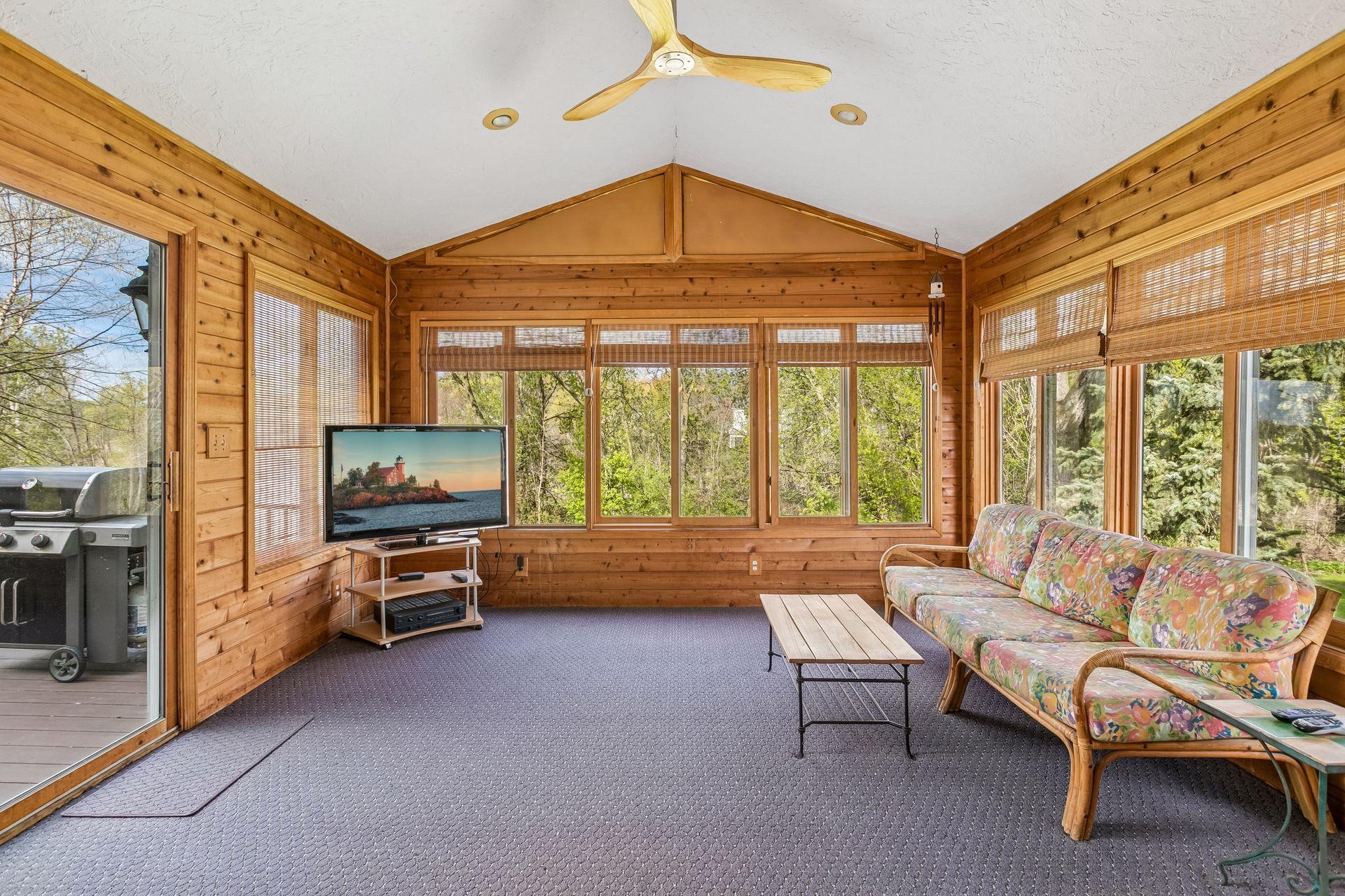 3 season porch overlooking private backyard