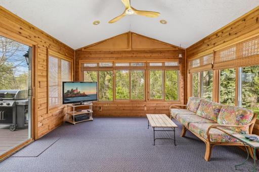 3 season porch overlooking private backyard