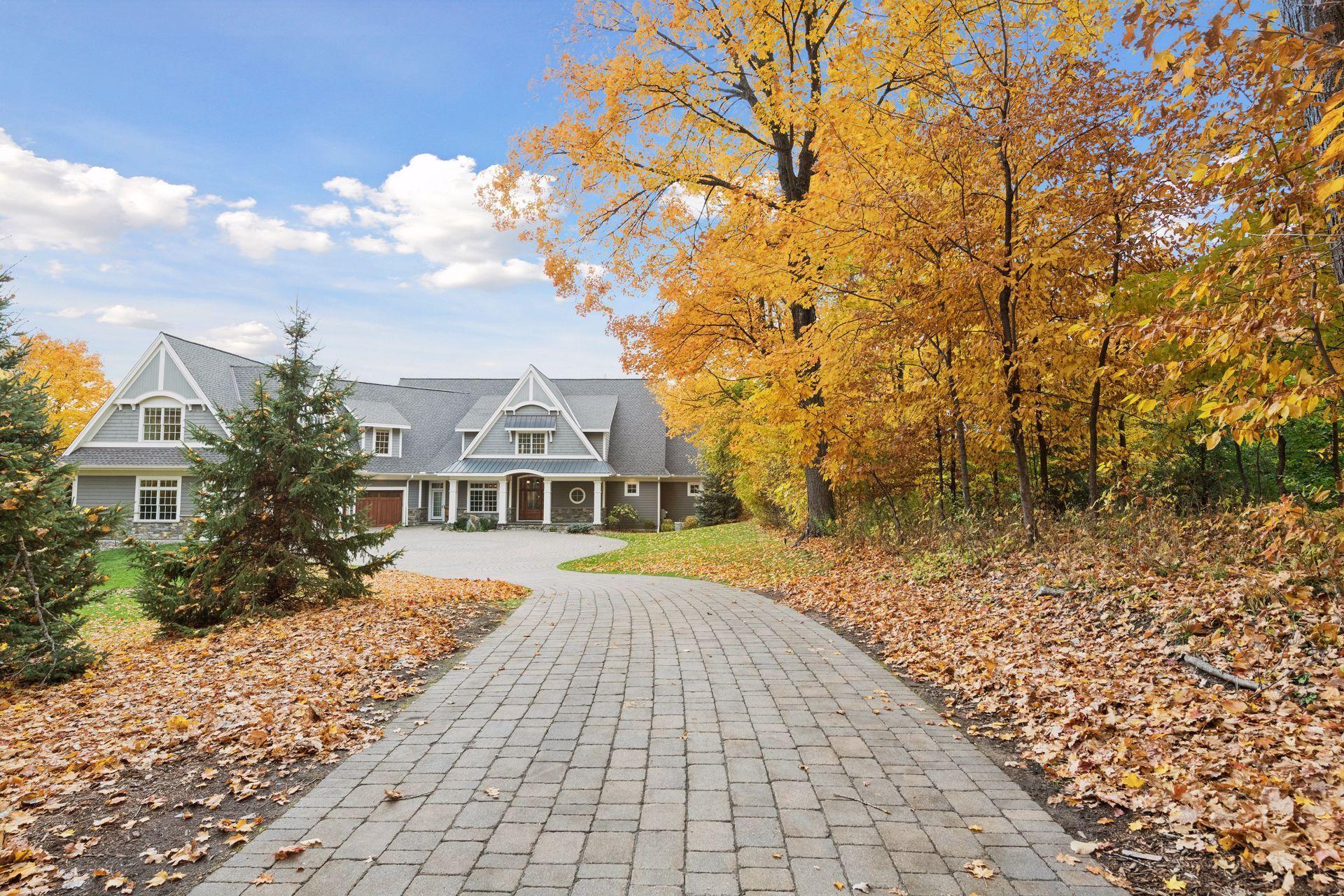 Long, tree-lined drive enhances privacy