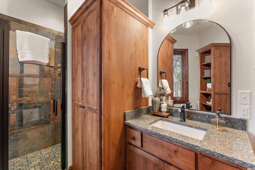 Lower-level bath #7 with convenient washer and dryer in cabinet, ideal for lake days