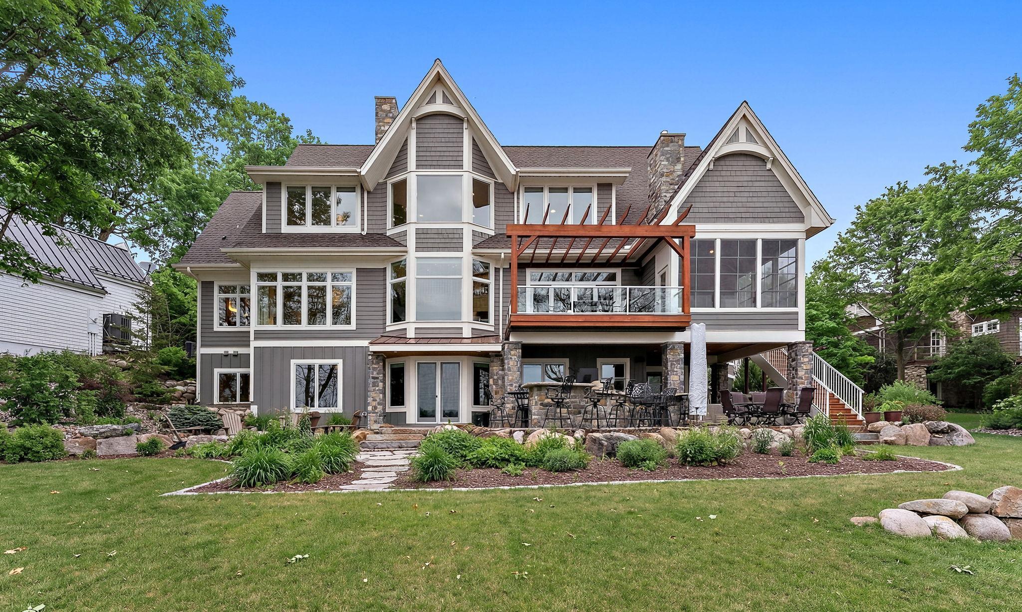 Walkout lower level design seamlessly connects indoor living to outdoor lake life