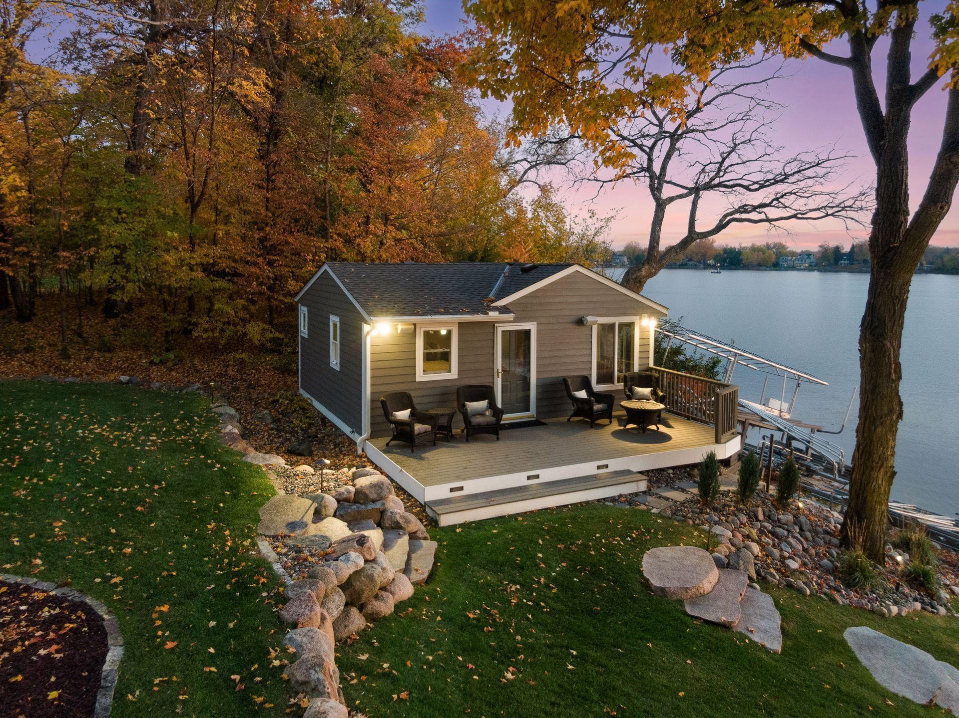 Guest cottage offering private accommodations for guests, along with convenient boat house storage below. New roof installed in 2025