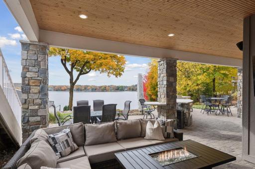 Covered outdoor lounge designed for relaxing, hosting friends and family, and enjoying the game