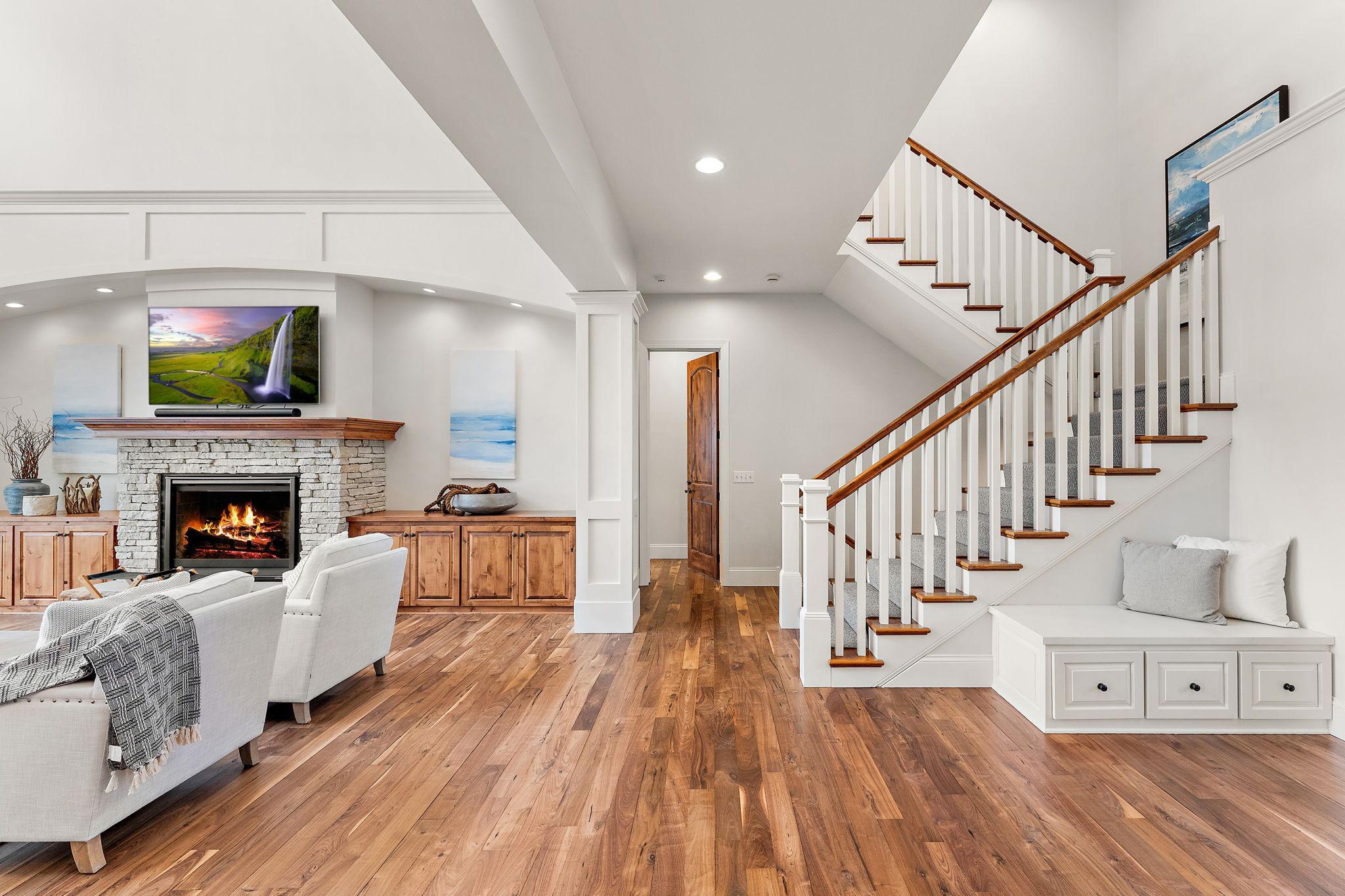 Beautifully refinished hardwood floors complemented by fresh paint