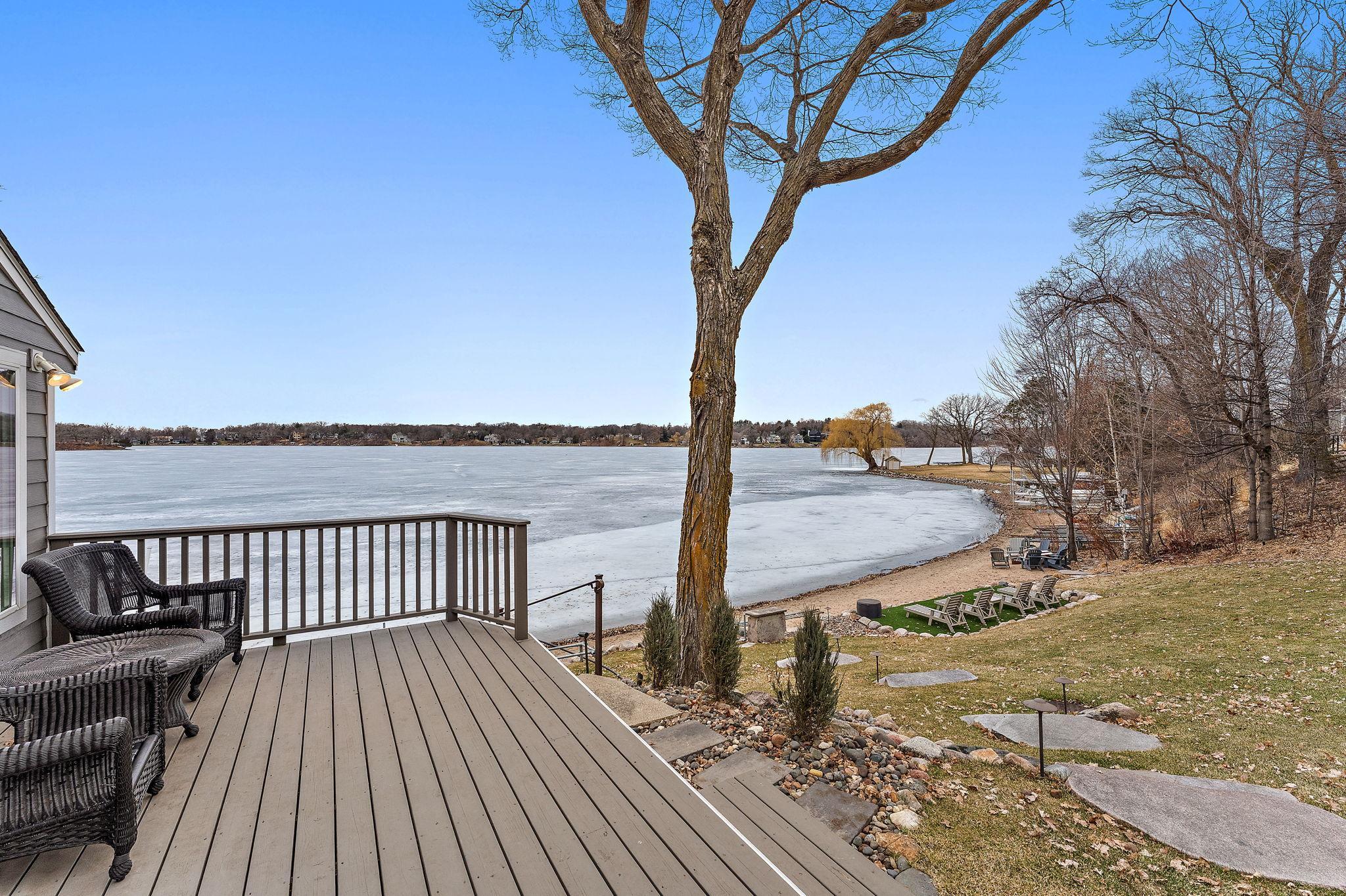 Lower-level cottage provides generous storage for lake gear, along with a washer and dryer for added convenience