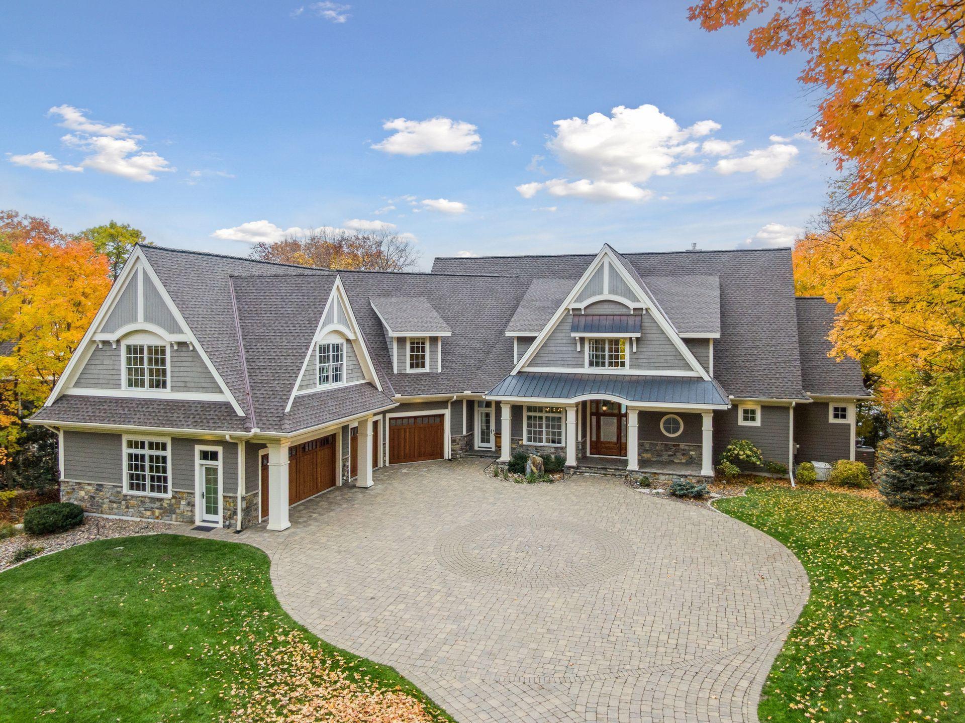 Custom circular paver driveway with built-in lighting