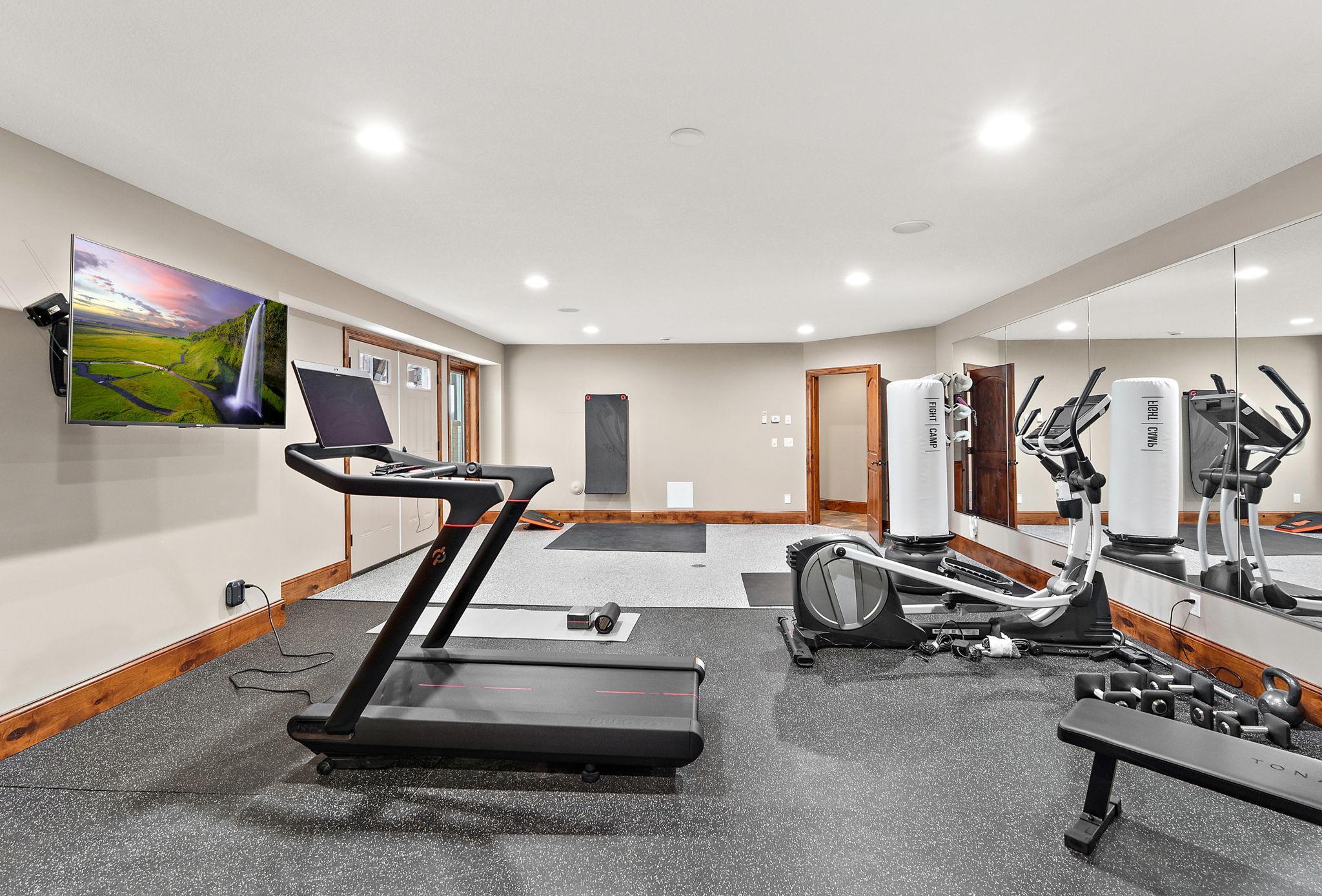 Expansive home gym with room for additional cardio and strength training equipment