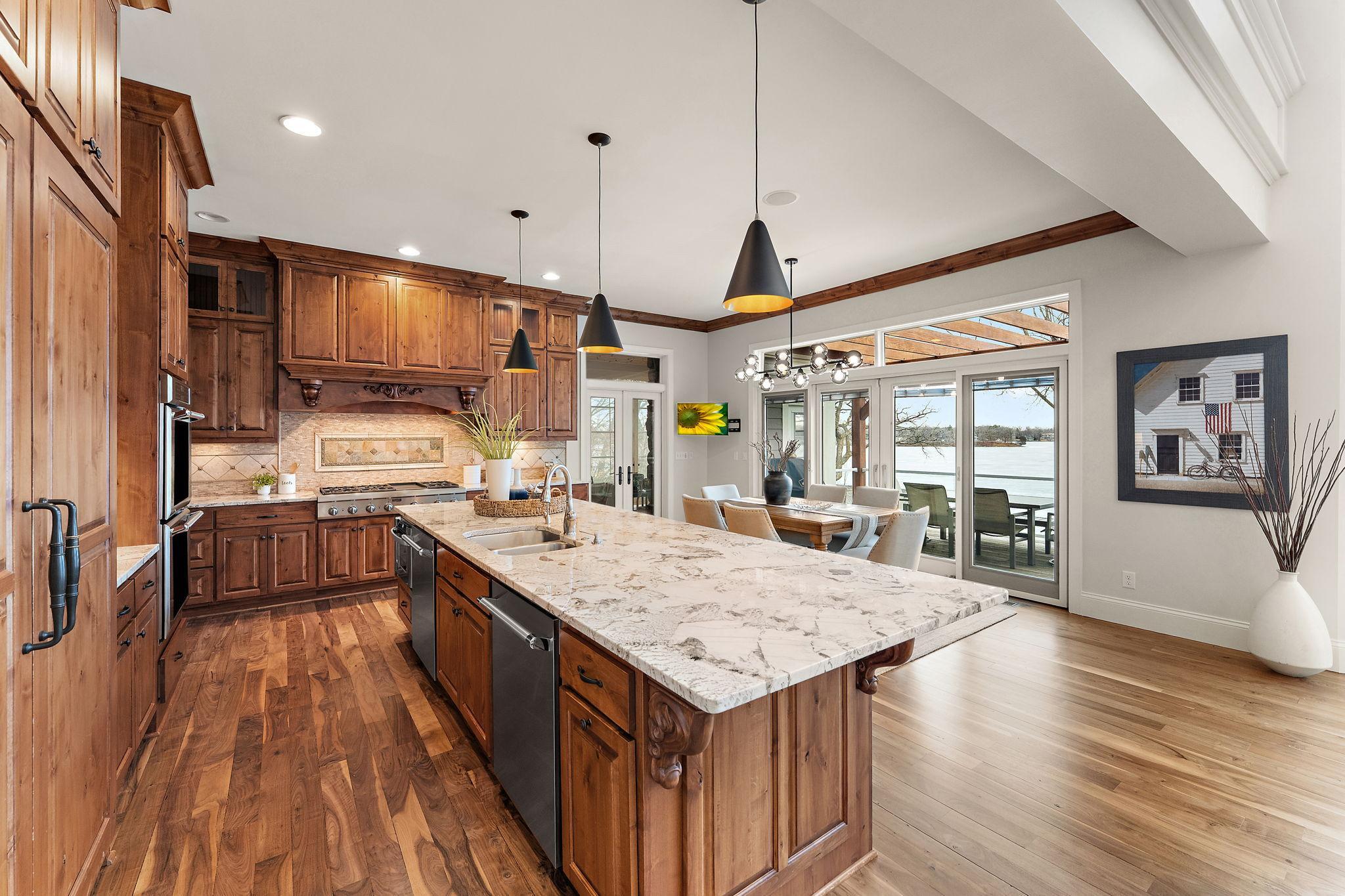 Featuring a gourmet chef’s kitchen complemented by fresh paint and new light fixtures throughout