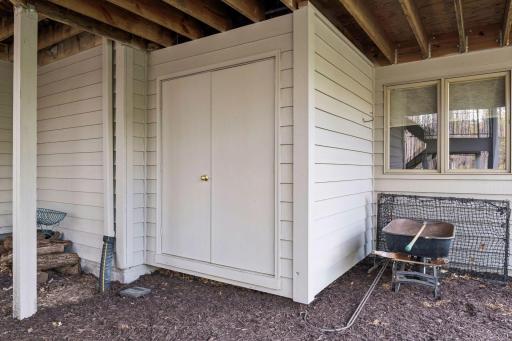 Shed under screen porch is great place to store porch furniture