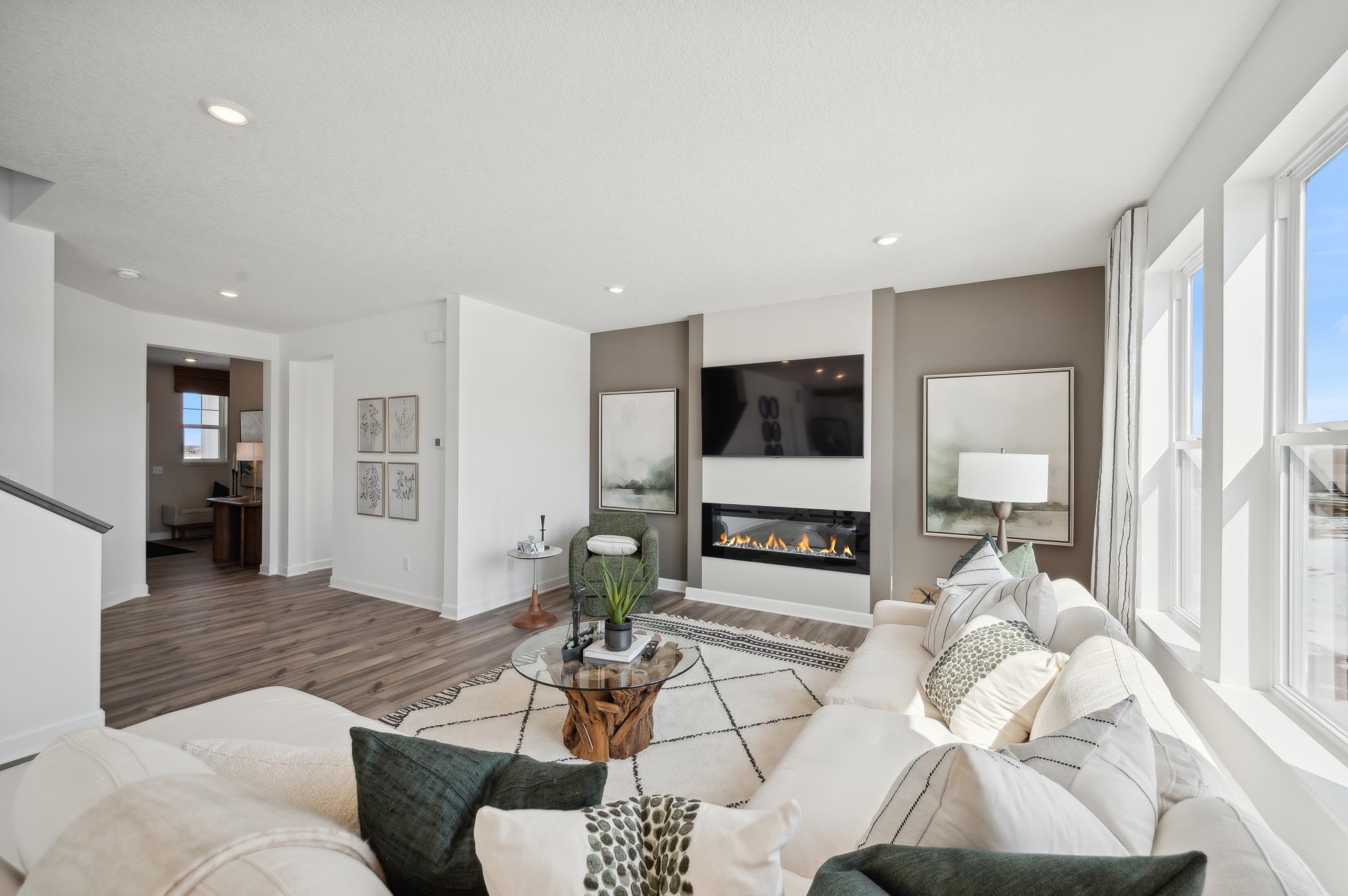 (Photo of model home, finishes will vary) Another angle of this bright and spacious great room!