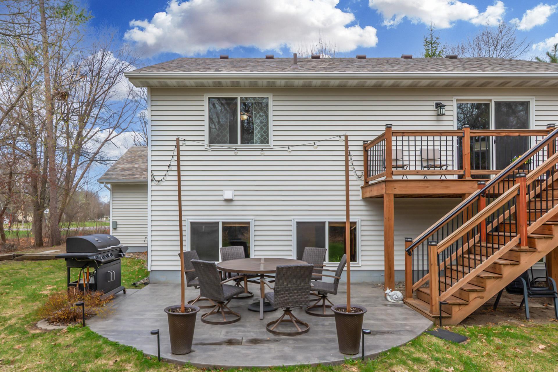 A private outdoor retreat just beyond the living room, offering tranquil views and a peaceful setting