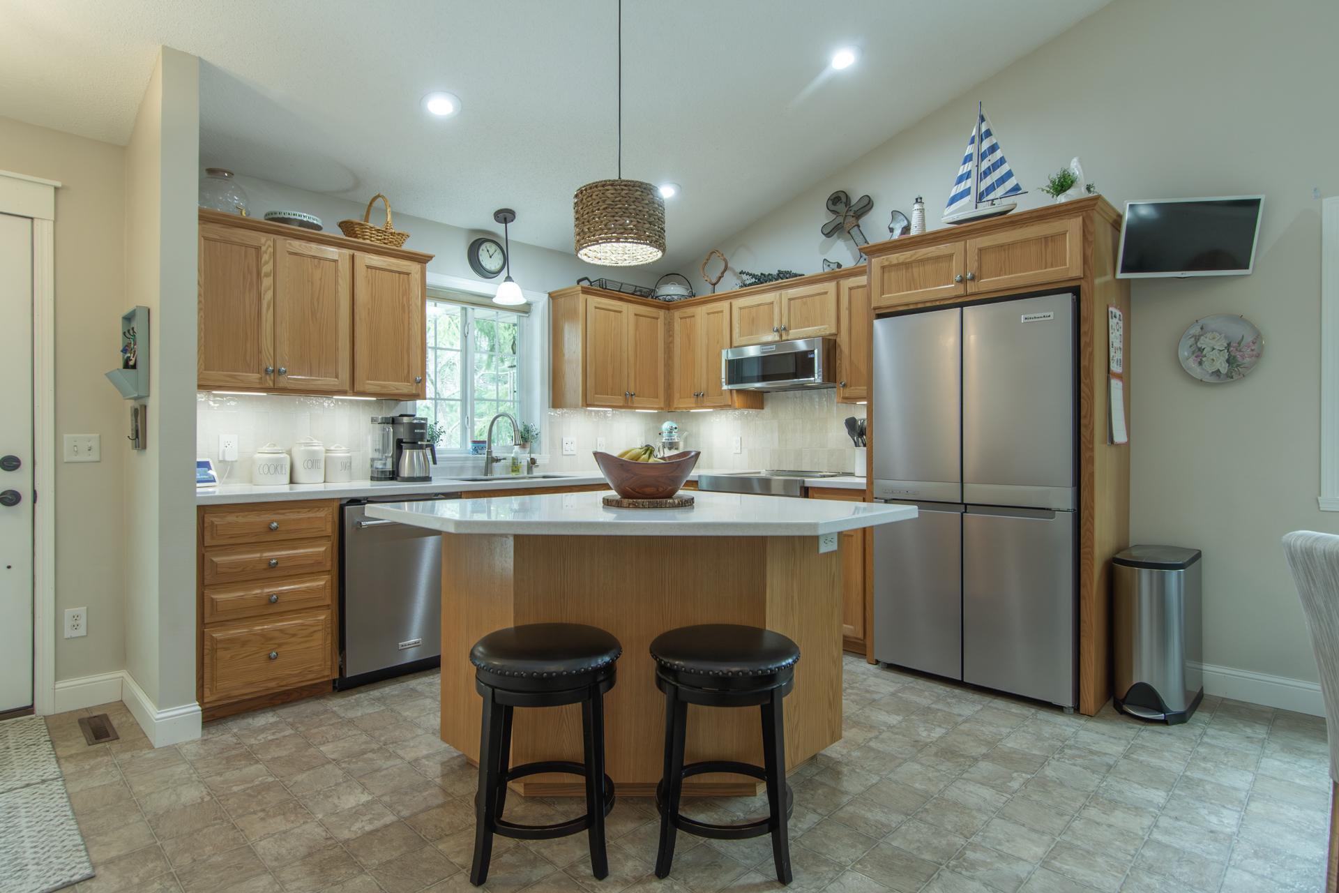 Gorgeous kitchen with stylish countertops and backsplash