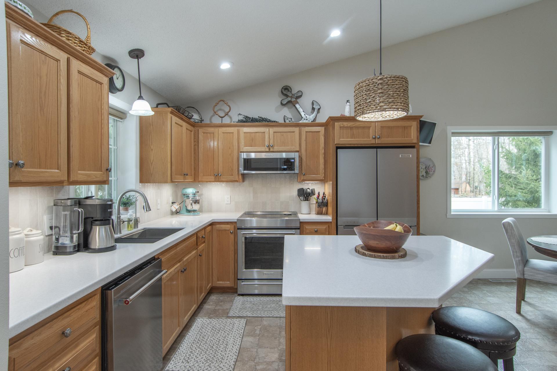 Equipped with modern appliances and ample cabinetry