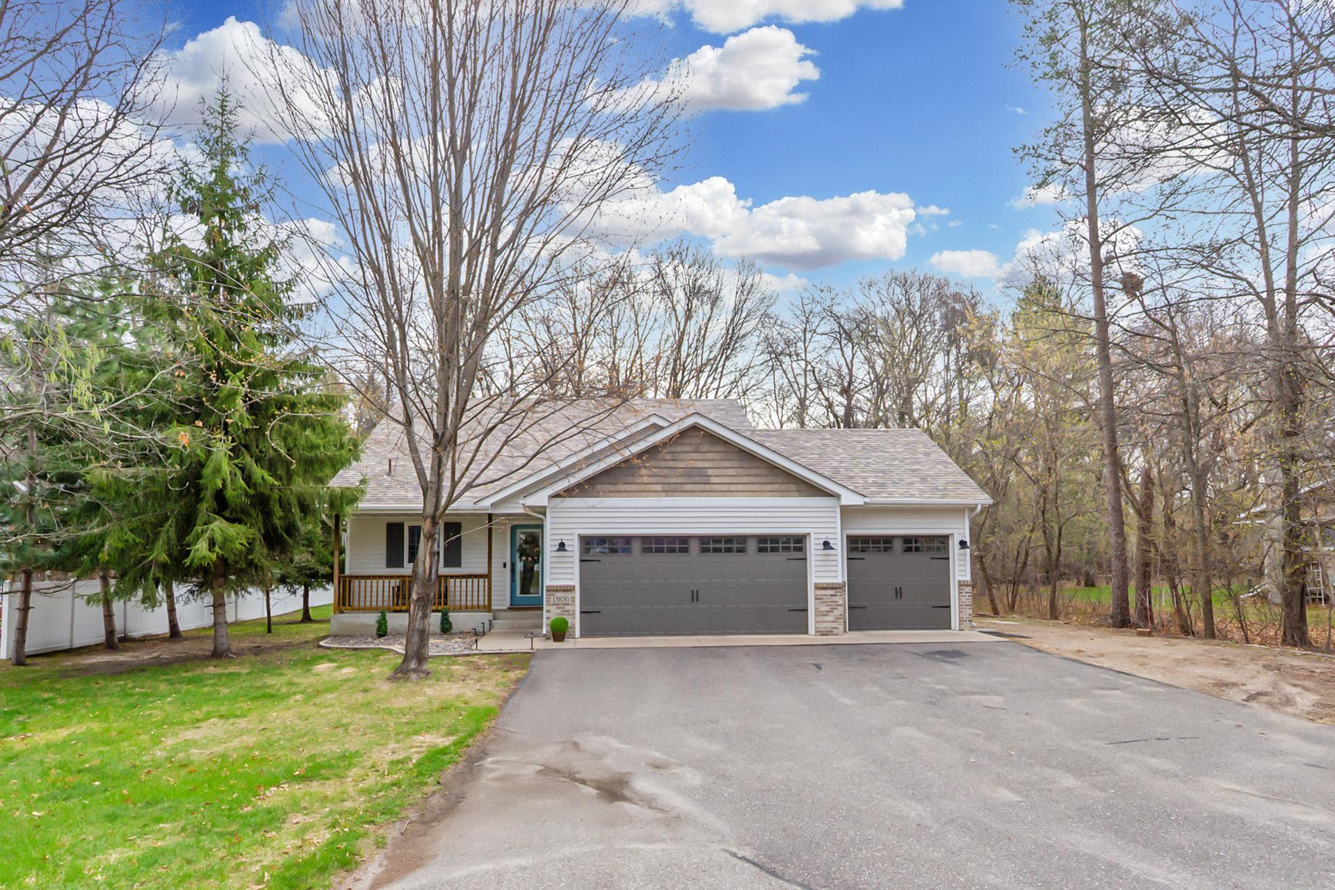The home’s attractive façade is perfectly framed from the driveway, offering a refined arrival experience