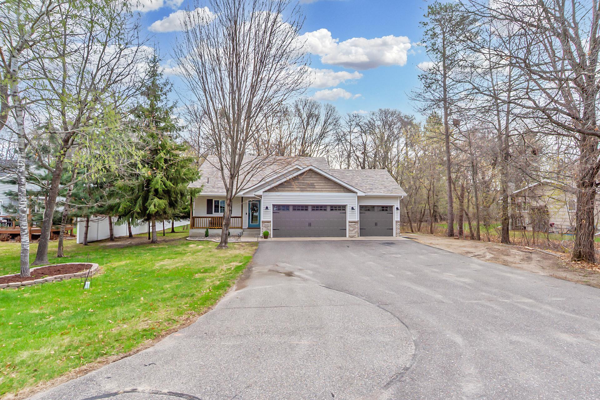 A welcoming approach from the driveway sets the tone for this beautifully maintained home