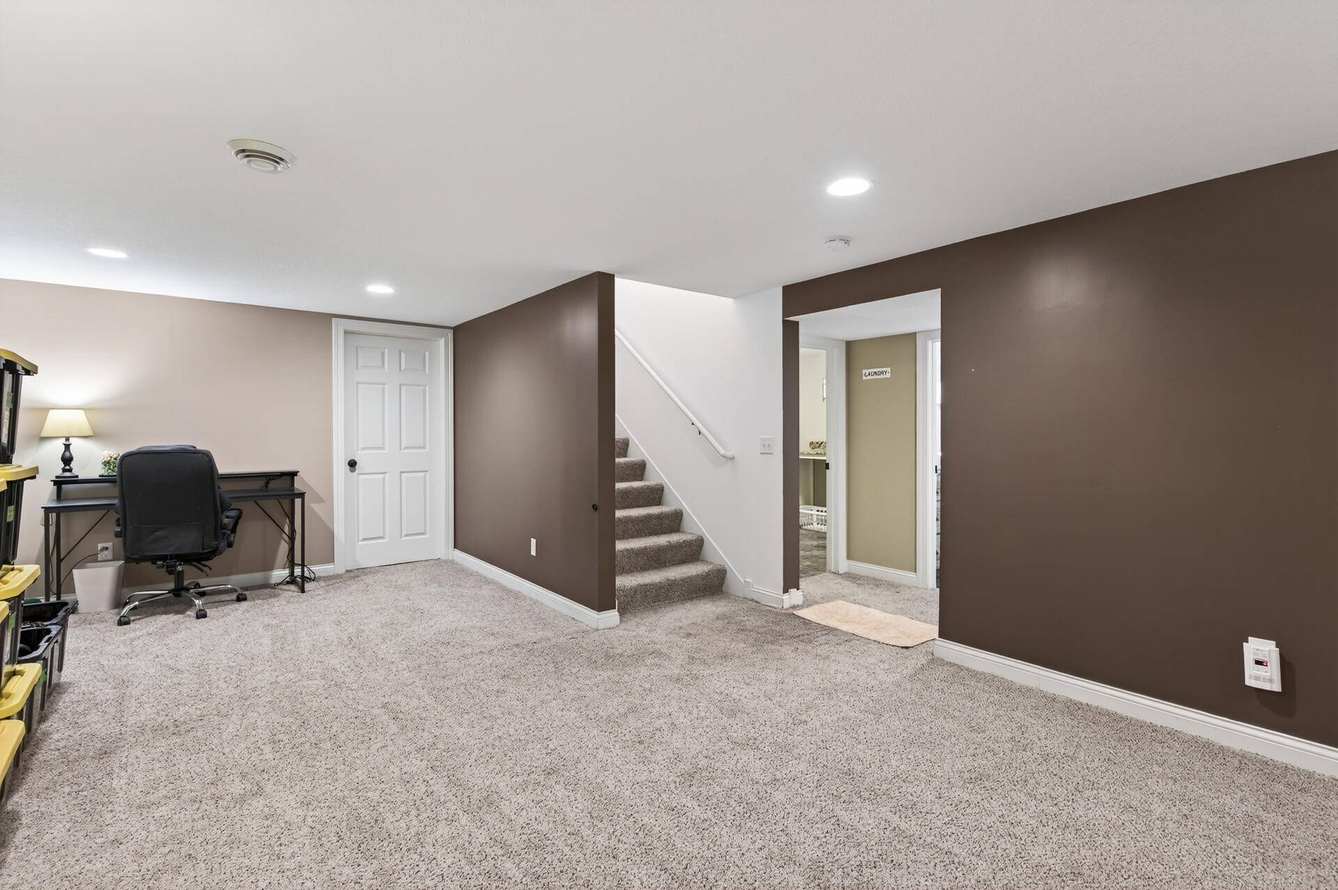 Step downstairs to the fully finished lower level, around the corner is a HUGE 7'x11' storage room too! All finishes are white trim, knockdown ceilings, recessed lighting, neutral colors, 6-paneled white doors.
