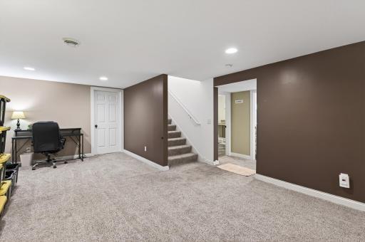 Step downstairs to the fully finished lower level, around the corner is a HUGE 7'x11' storage room too! All finishes are white trim, knockdown ceilings, recessed lighting, neutral colors, 6-paneled white doors.