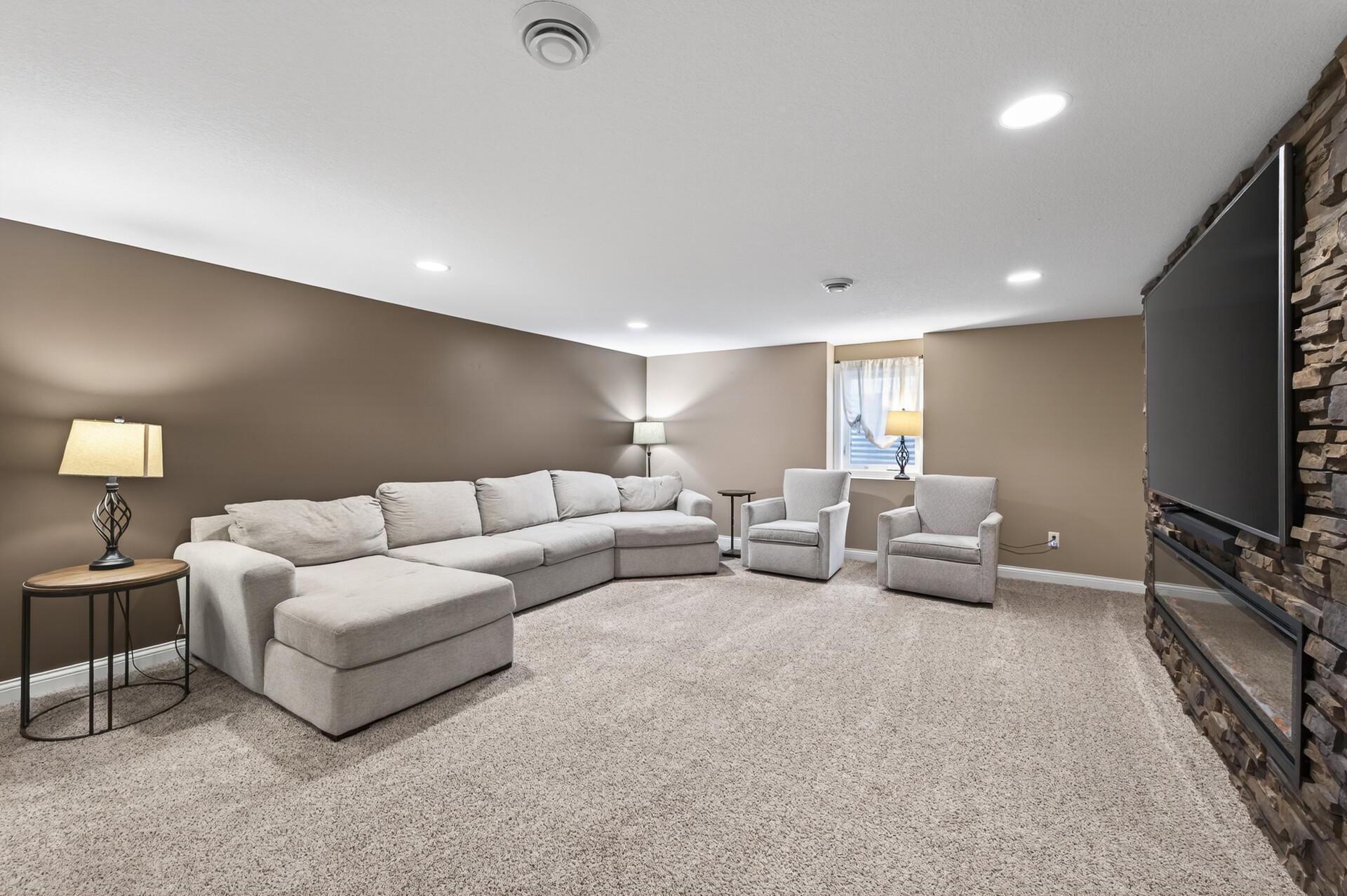The lower level is finished with a large open recreation room/family room area to use as you desire! Family room, theatre room, exercise area, office or hobby area...you decide!