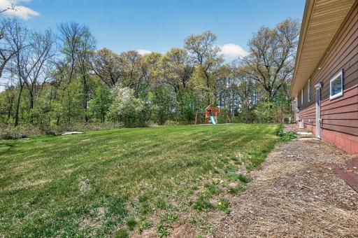 Large spacious open backyard, great for yard games and activities, or even a large garden