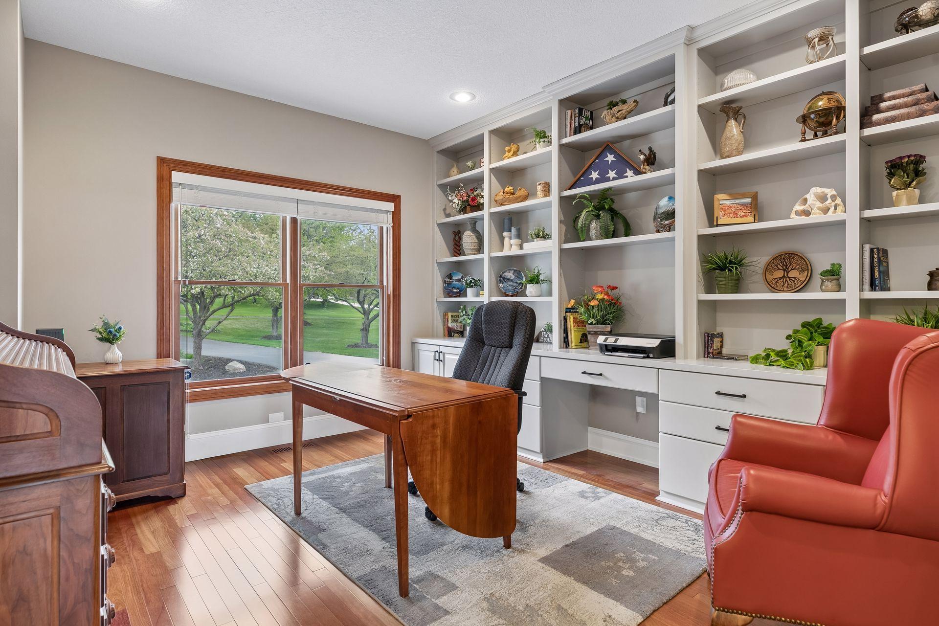 Front office space with built in desk top and cabinets
