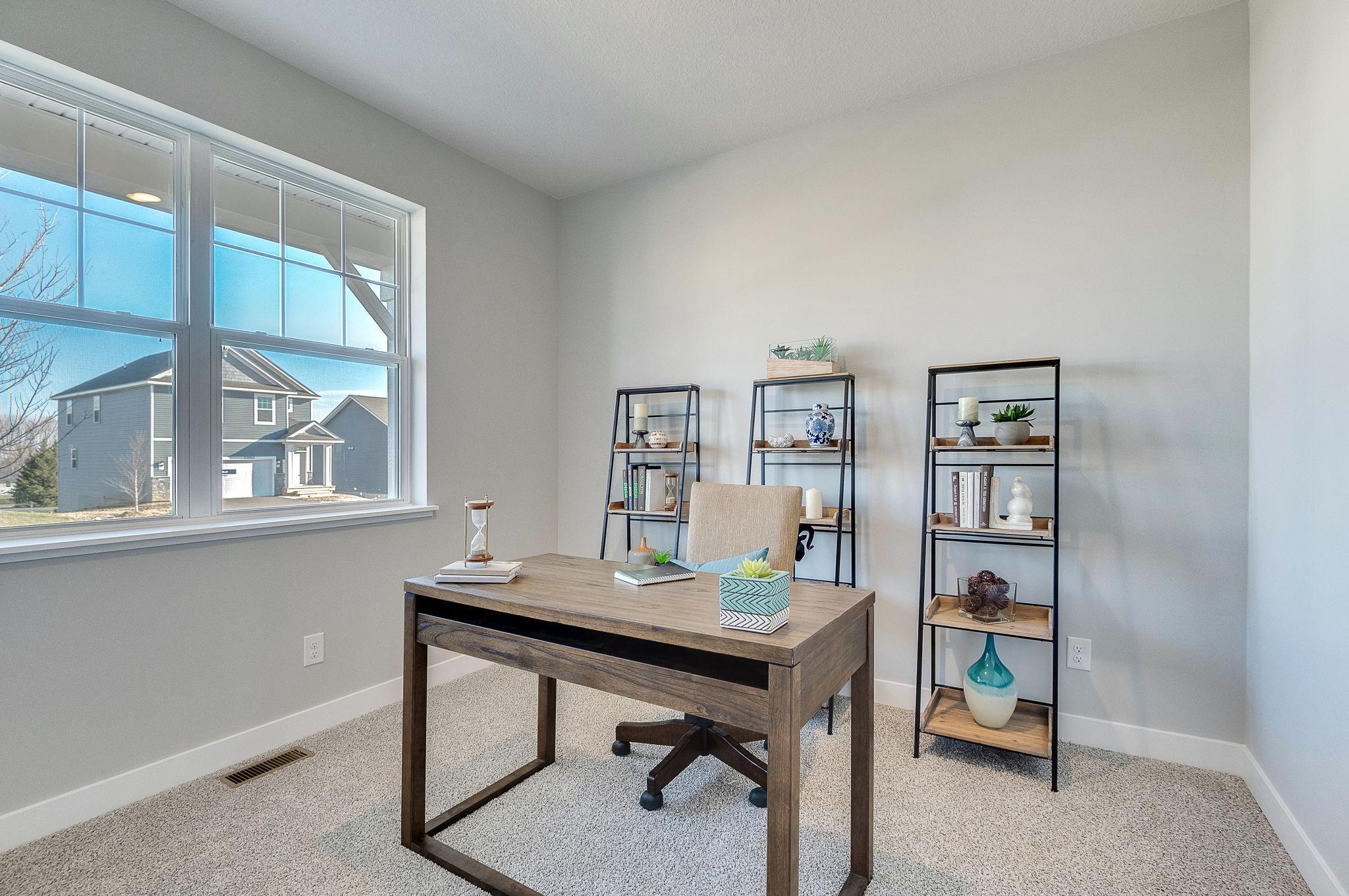 Three bedrooms total in this home, use one as an office! Model home, finishes will vary.