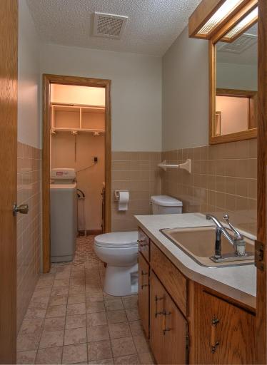 Main floor half bathroom just off the garage