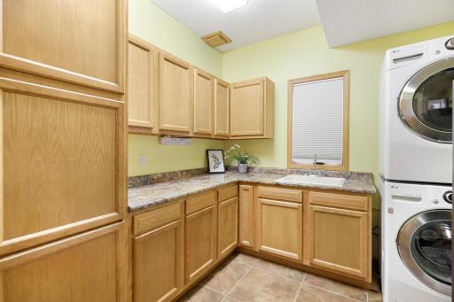 Large laundry room with plenty of storage