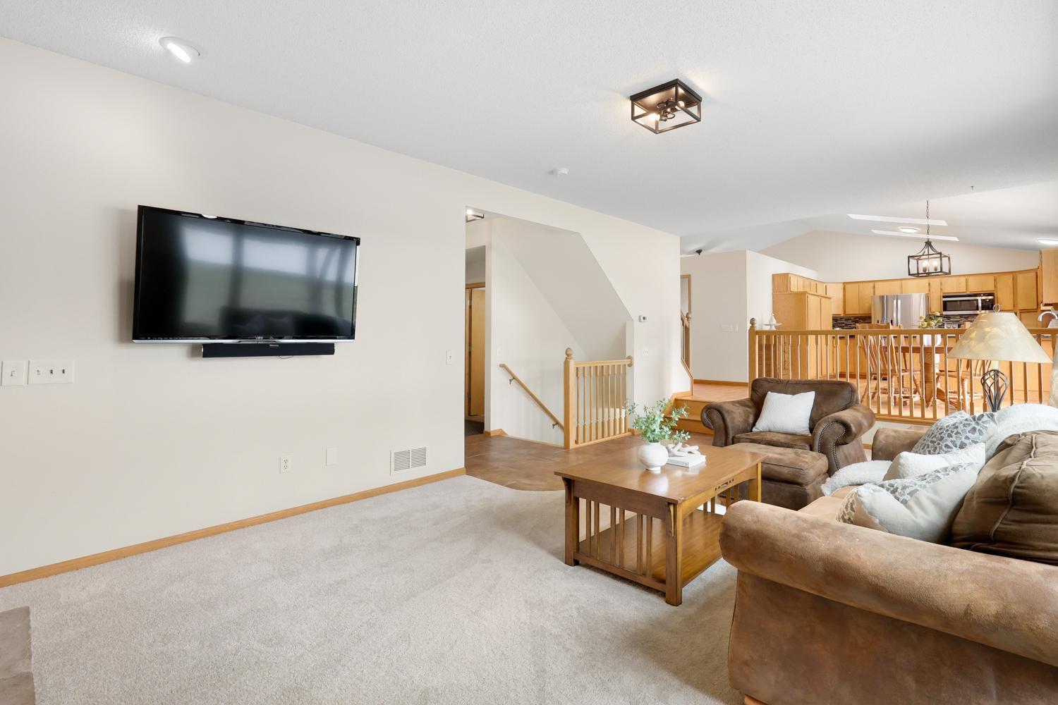 Open and spacious living room with fresh carpet