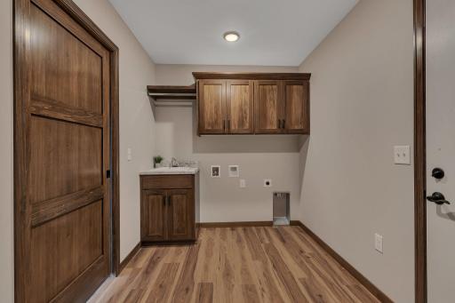 36" wide doors throughout, zoned in floor heat, Laundry room with mudroom closet that doubles as a safe room!