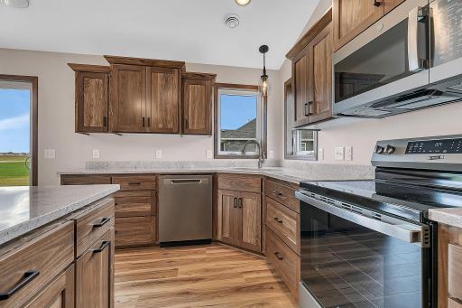 Granite kitchen countertops and double window with corner kitchen sink