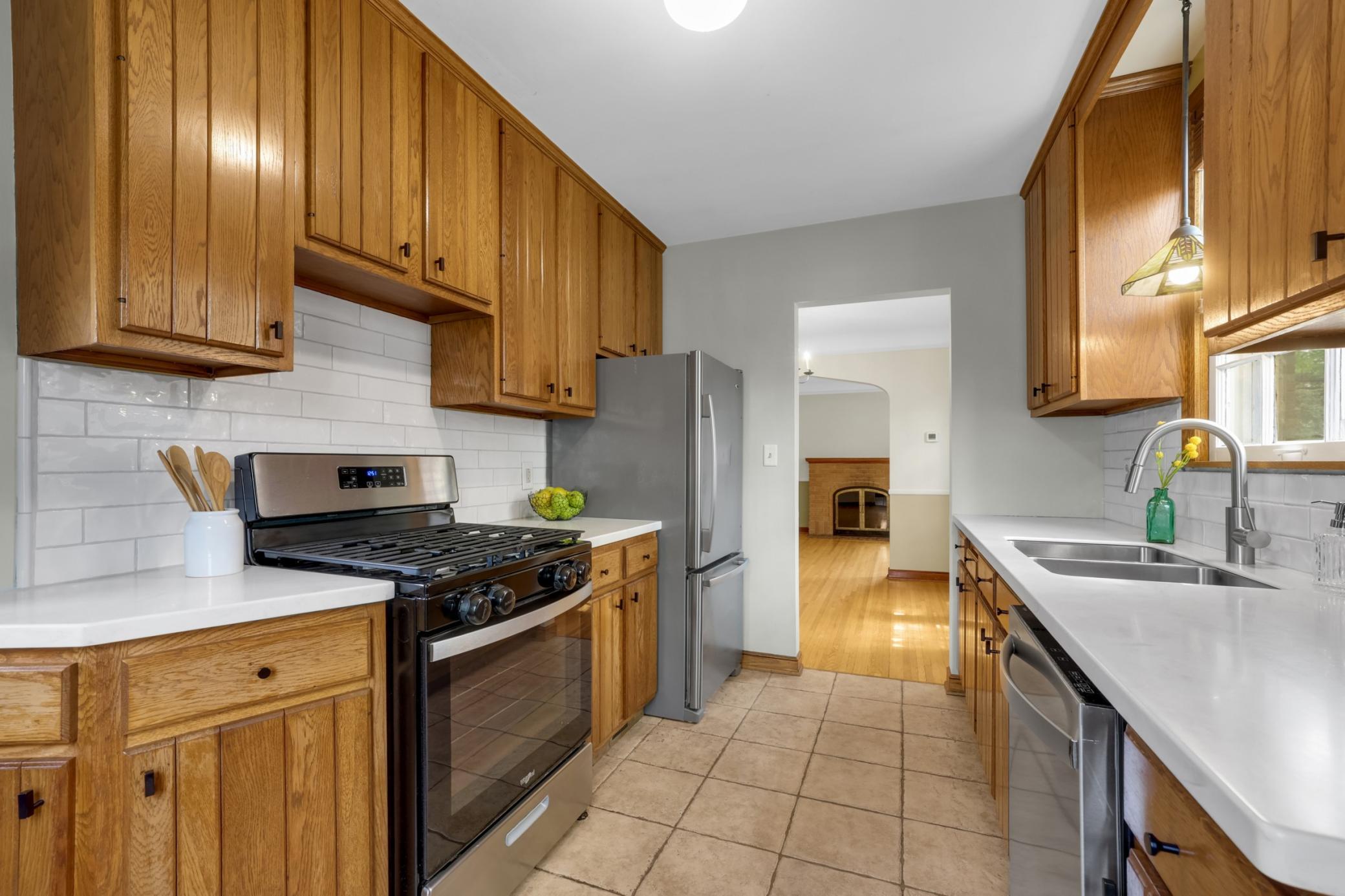 The kitchen was updated in 2024, featuring new counter tops, backsplash, and appliances.