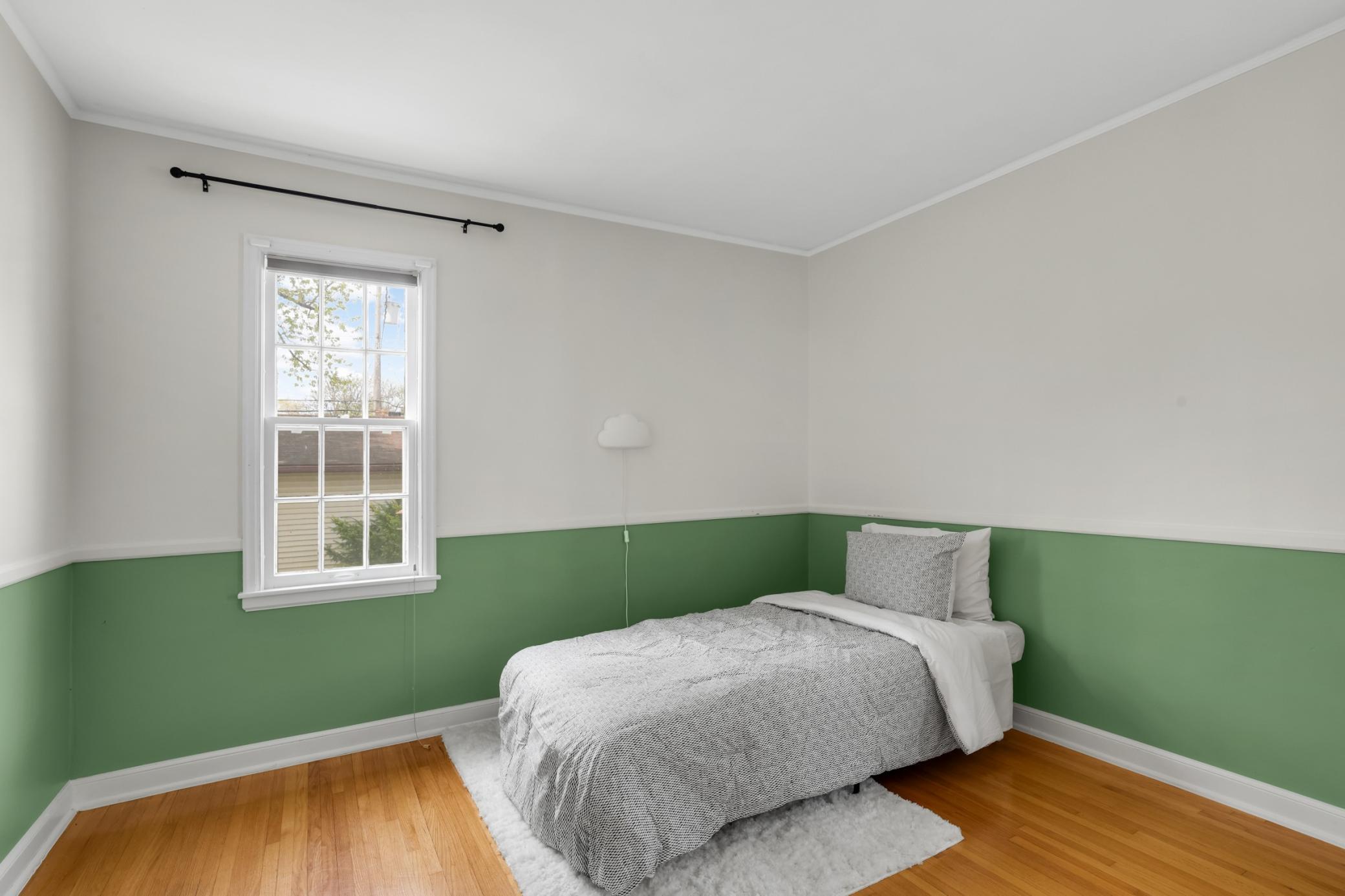 The 2nd main level bedroom is fantastic office, nursery, or kid room!