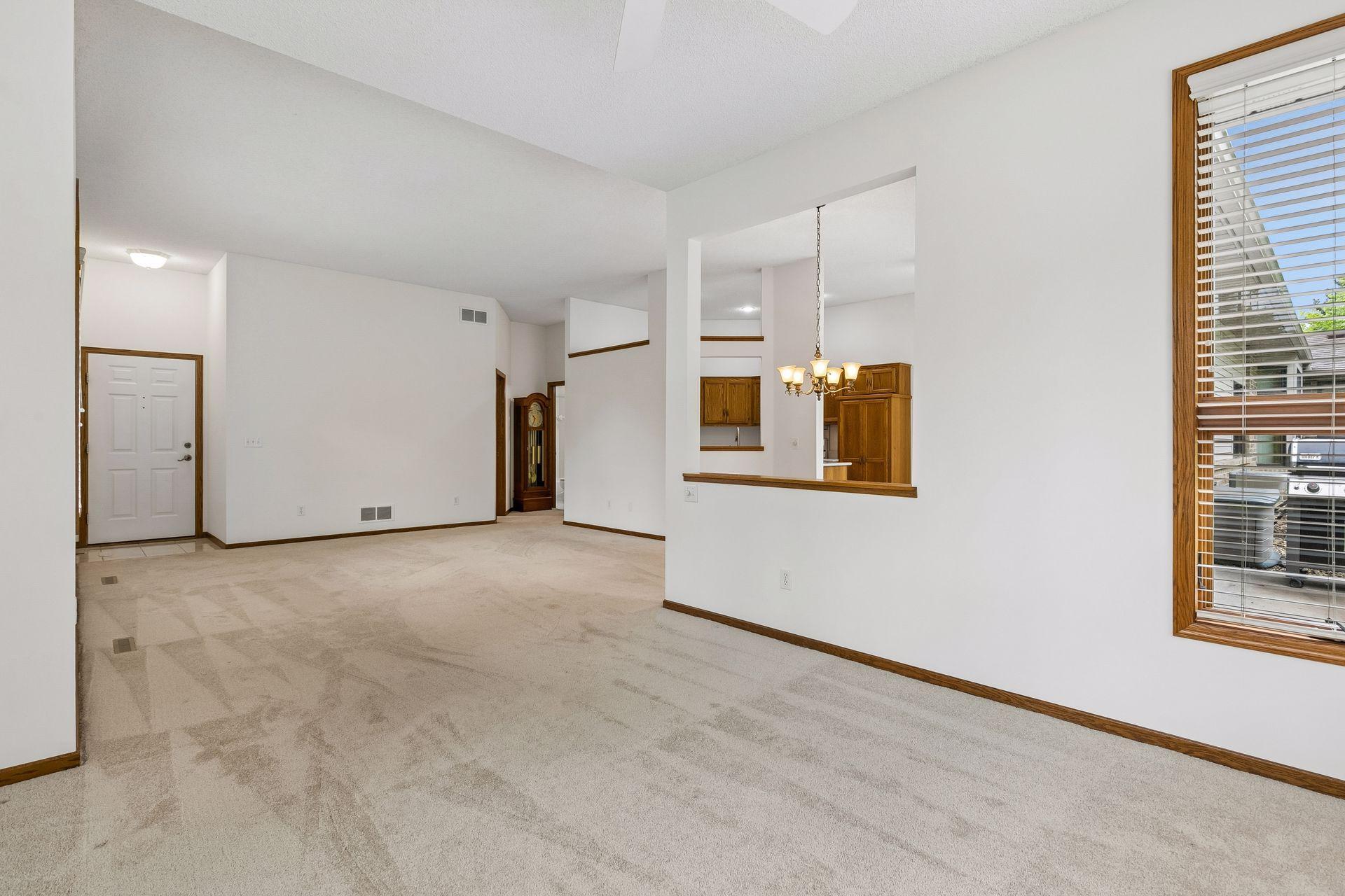 Standing in the sunroom looking at the living room