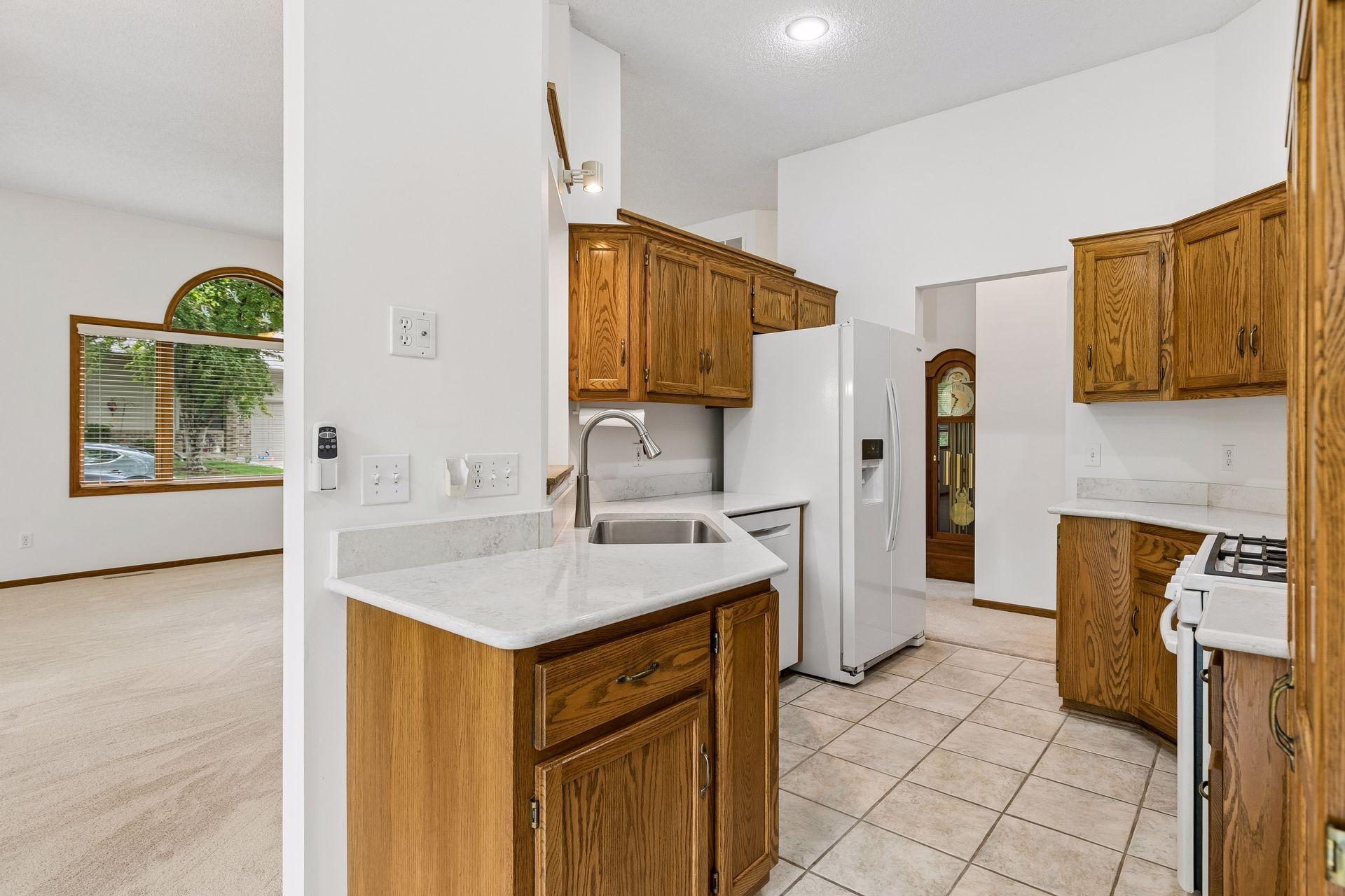 The kitchen has ample storage and counter space