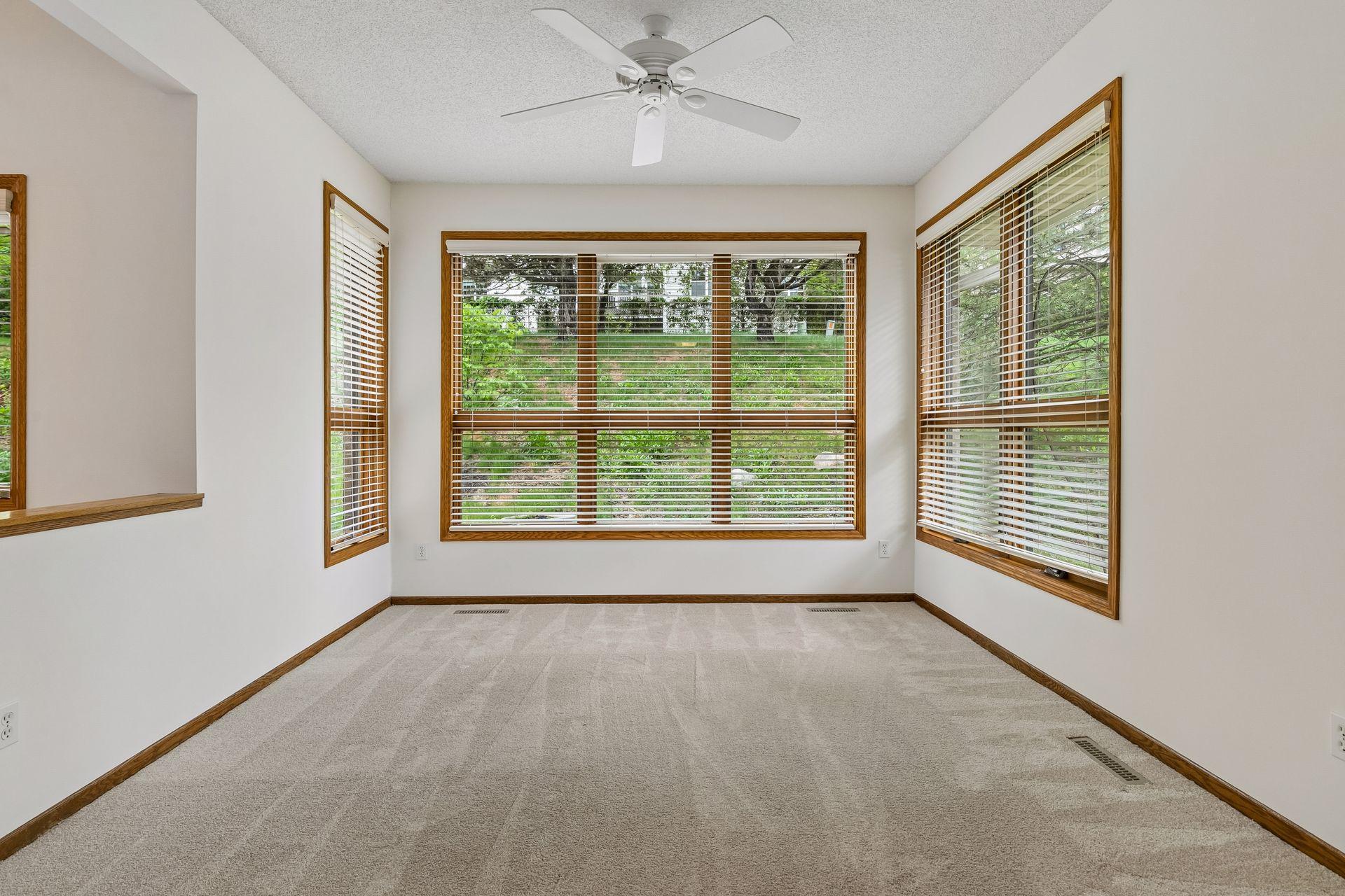 The sunroom has windows on the north, west, and south providing great light all year round