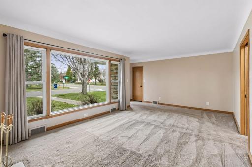 Don't miss the handy coat closet and tiled entryway; perfect spot to greet guests.