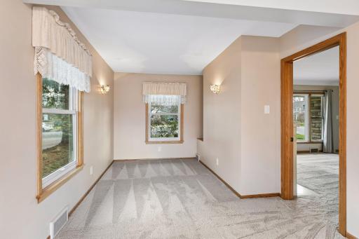 This space is off of dining room and could be the perfect den, office, or sunroom area.