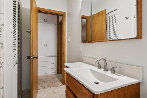 This bathroom also has a linen closet to the left, and in the hallway is another linen closet area; perfect for all of your storage needs!