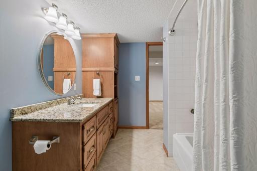 This bath has been updated and also has a bathtub, and loads of storage.