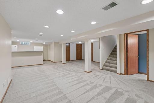 There are loads of recessed lights down here to make this such a comfortable space to spend time in.