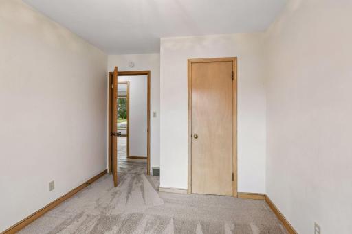 This room is the closest to the living room and to the kitchen. There is a handy pocket door to the living room.