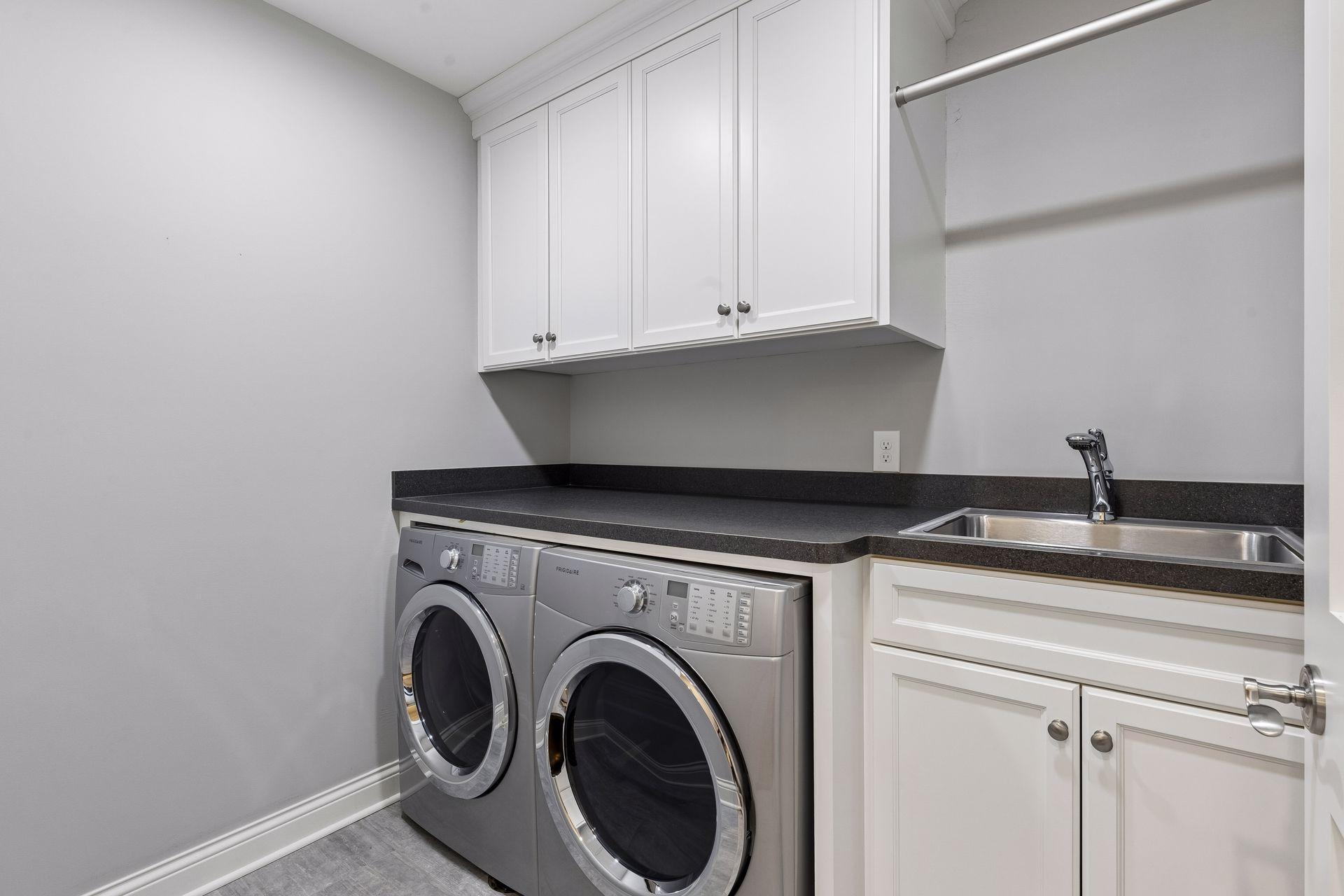 Laundry room with utility sink