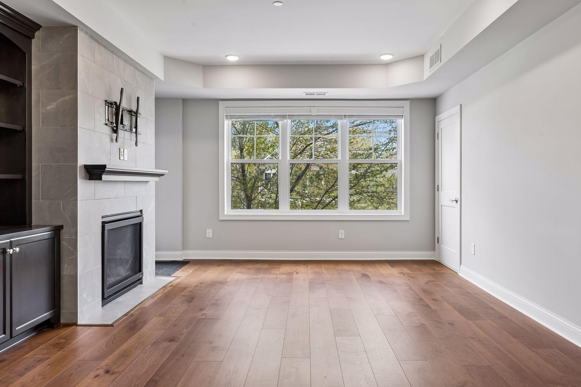 Living room with luxury vinyl plank flooring throughout main area