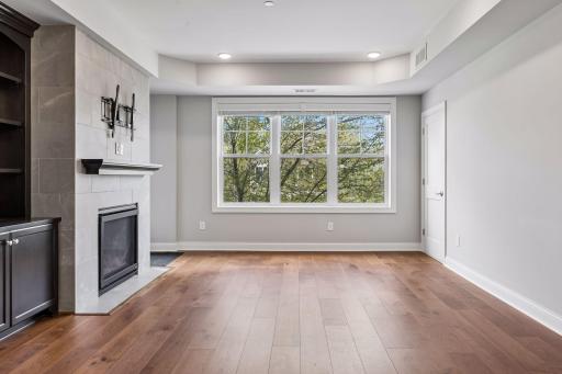 Living room with luxury vinyl plank flooring throughout main area