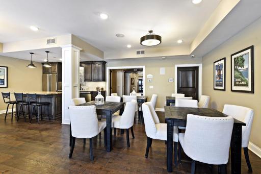 Spacious community club room with a comfortable sitting area plus tables and chairs â ideal for entertaining, gatherings, or casual get-togethers