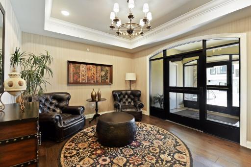 Welcoming front entry area with secure building access.