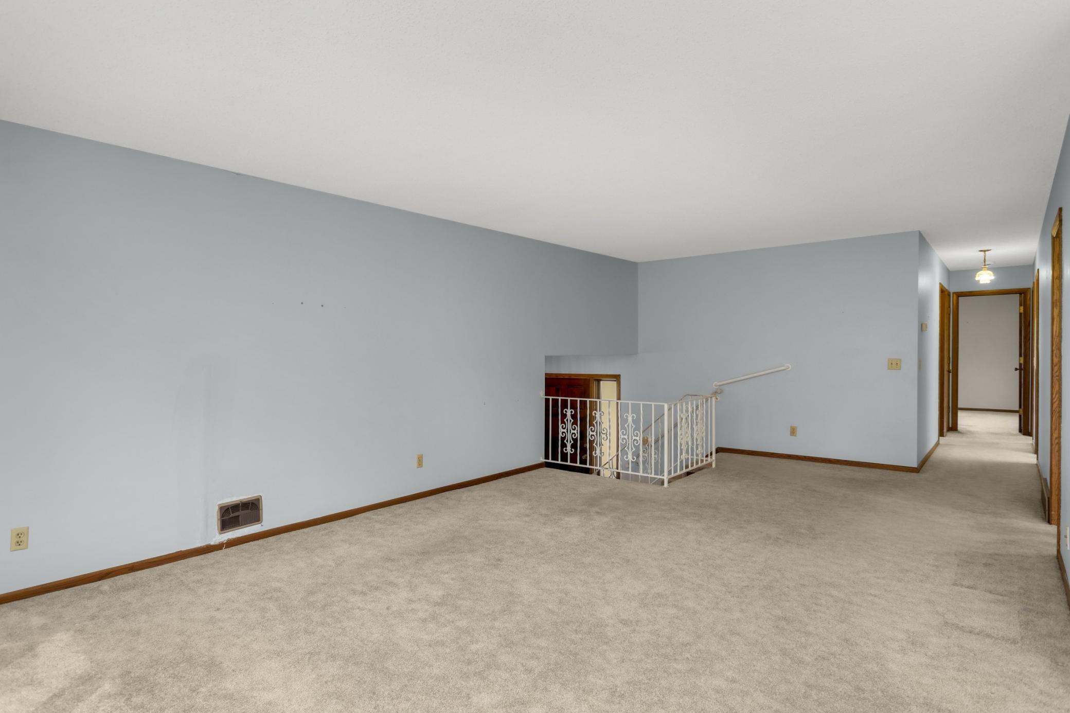 Open staircase to upper level living room.