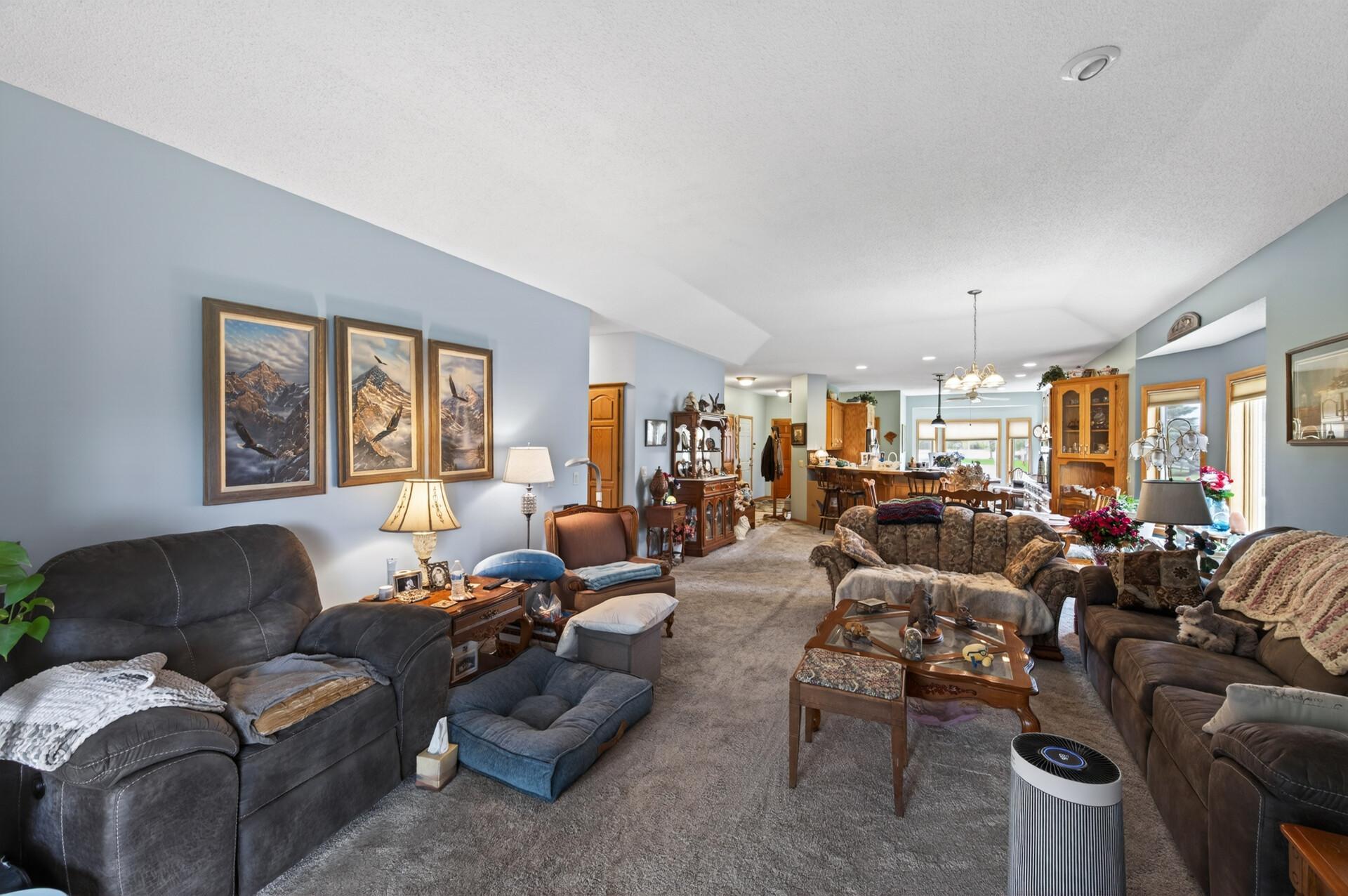 Abundant natural light floods the space with large windows throughout.