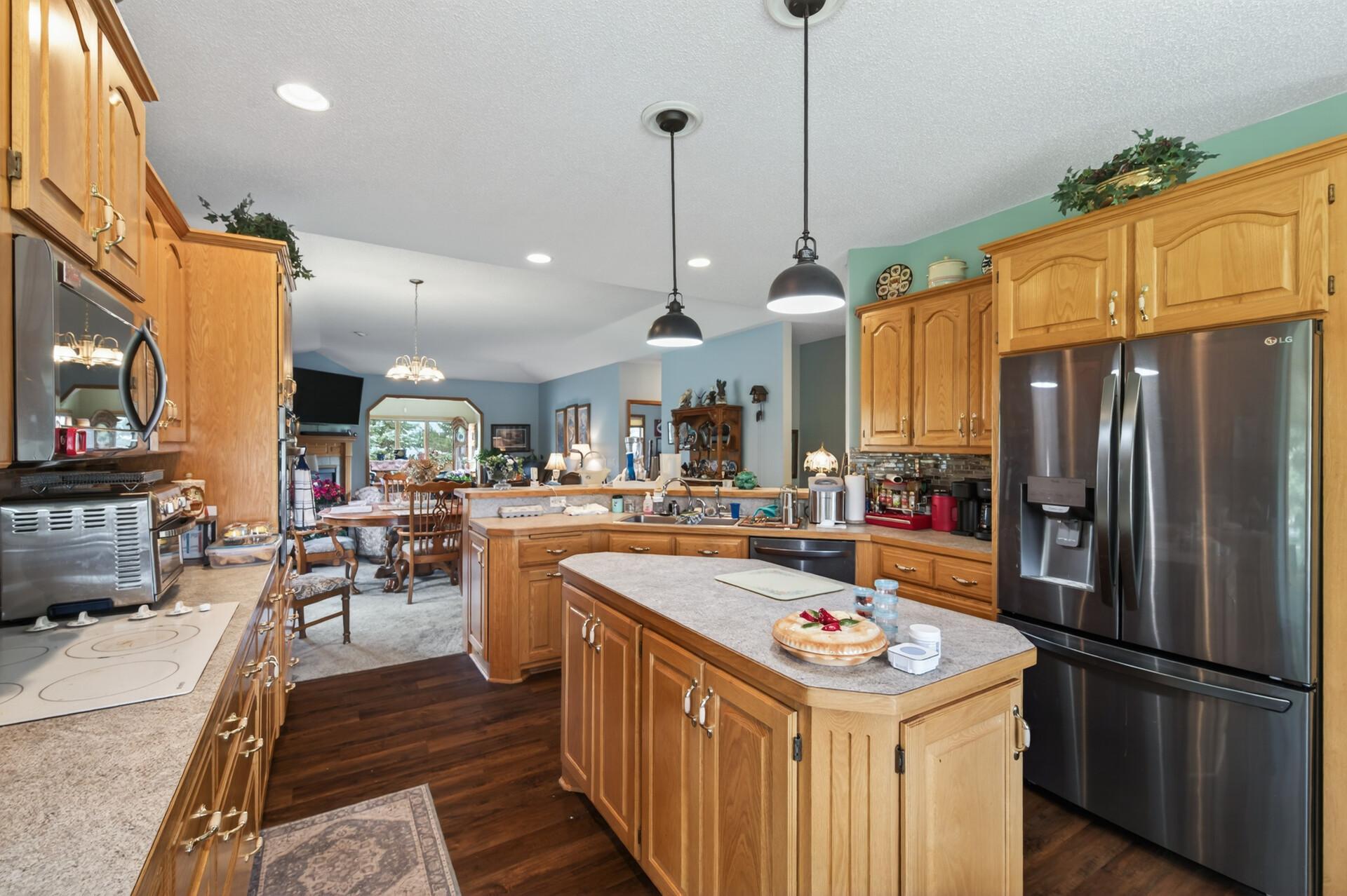 The center island adds extra storage and prep space while creating a natural spot to gather.